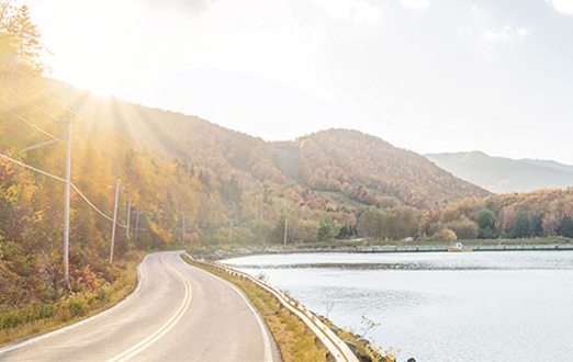 Road by mountains and water